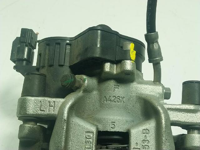 Zacisk hamulcowy tylny prawy Ford Focus 4 HP