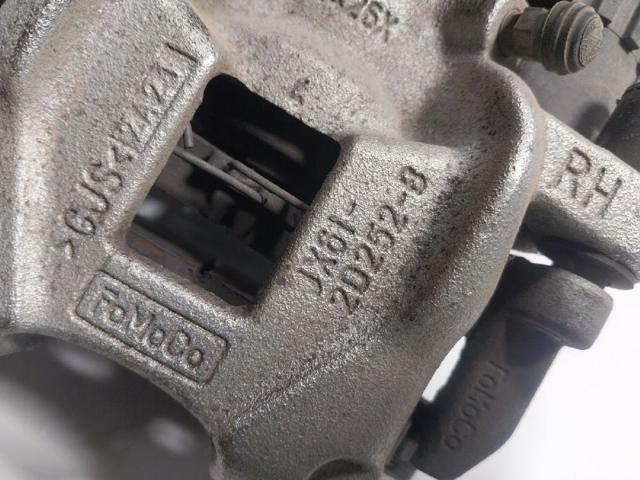 Zacisk hamulcowy tylny prawy Ford Focus 4 HP