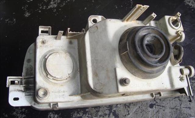 Reflektor lewy Nissan Vanette C23