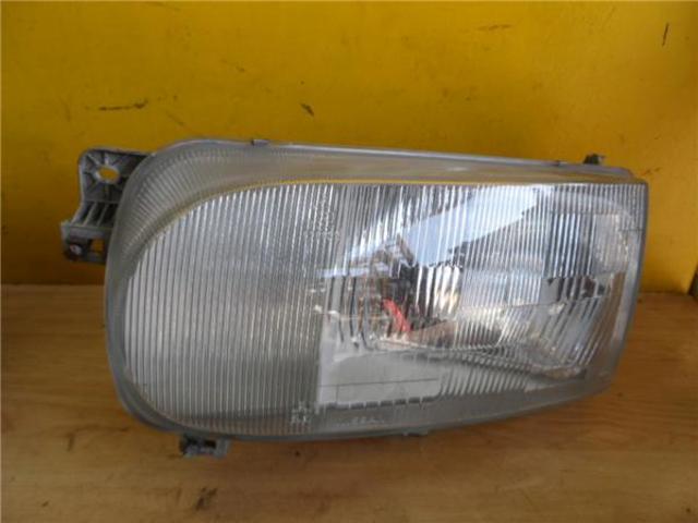 Reflektor lewy Nissan Vanette C23