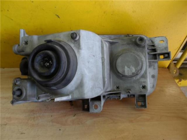 Reflektor lewy Nissan Vanette C23