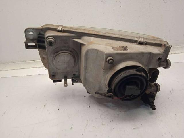 Reflektor lewy Nissan Vanette C23