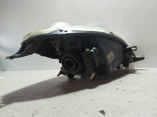 Reflektor lewy Nissan Note E11