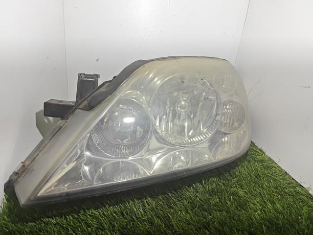 Reflektor lewy 26060AU300 NISSAN