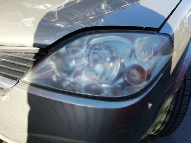 Reflektor lewy 26060AU800 NISSAN