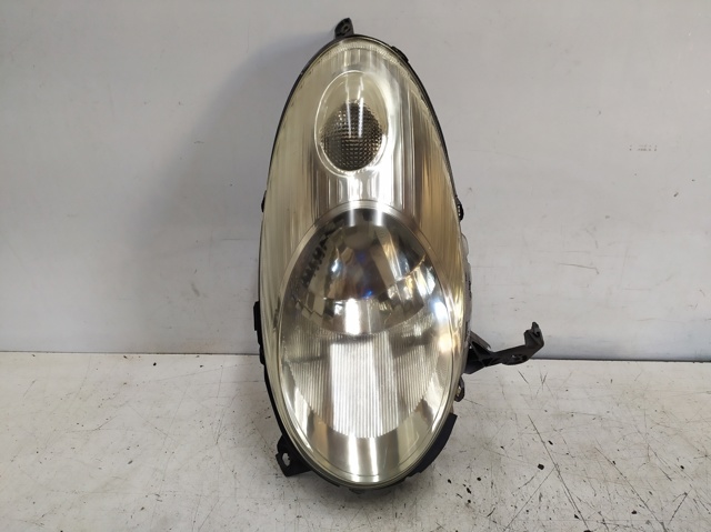 Reflektor lewy 26060AX700 NISSAN