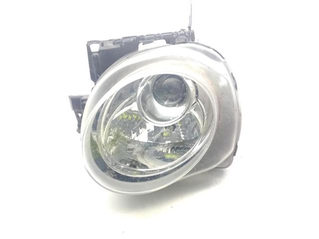 Reflektor lewy 26060BV90A NISSAN