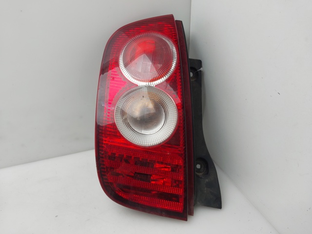 Lampa zespolona tylna lewa 26555AX720 NISSAN