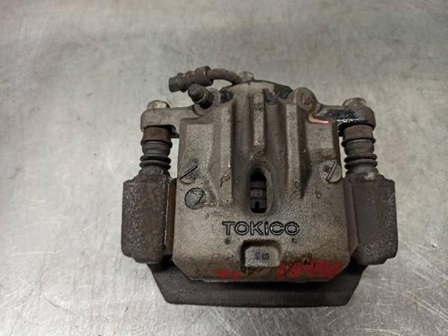 Zacisk hamulcowy tylny lewy 26692AJ010 SUBARU