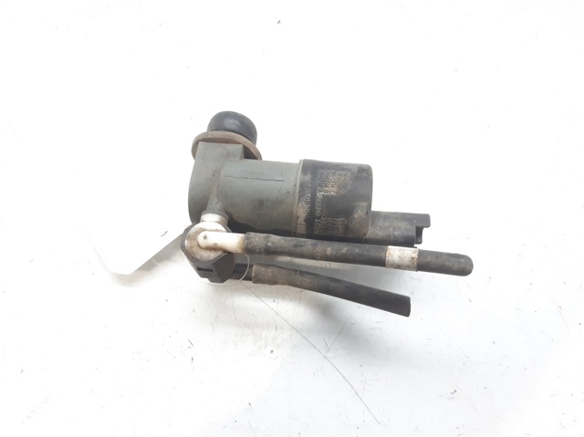 Pompka spryskiwacza szyby przedniej 28920BU010 NISSAN