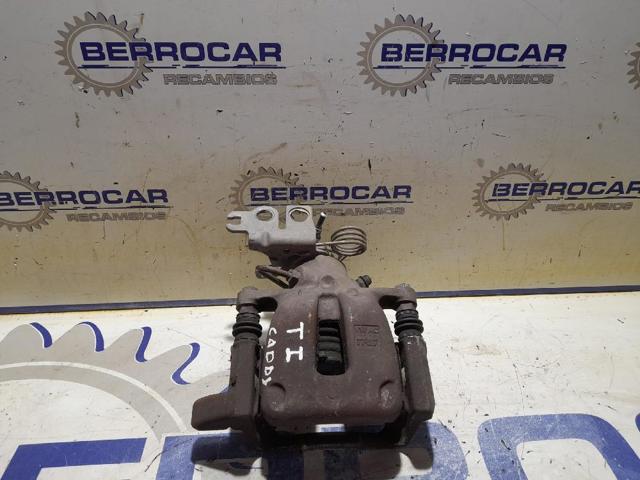 Zacisk hamulcowy tylny lewy 2K0615423B VAG