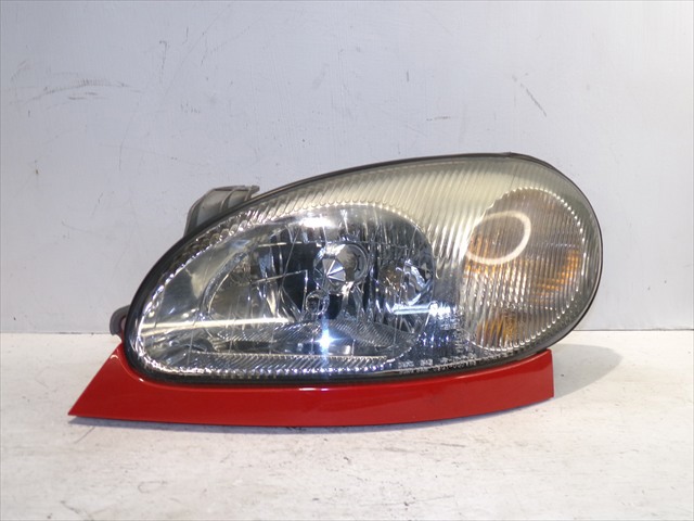 Reflektor lewy 301000783 GM