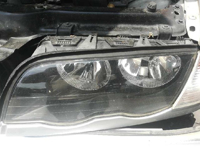 Reflektor lewy 301089205 BMW