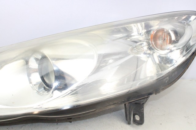 Reflektor lewy 301213201 PEUGEOT