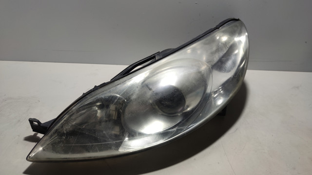 Reflektor lewy 301213273 PEUGEOT