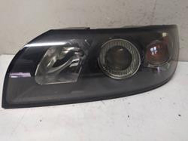Reflektor lewy 30678898 VOLVO