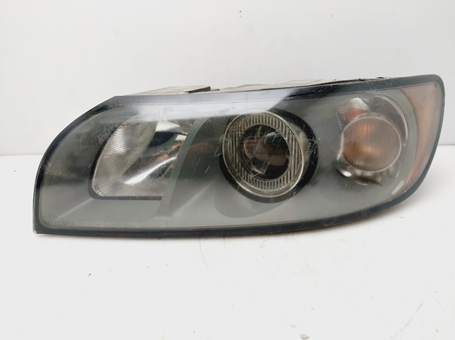 Reflektor lewy 30698885 VOLVO
