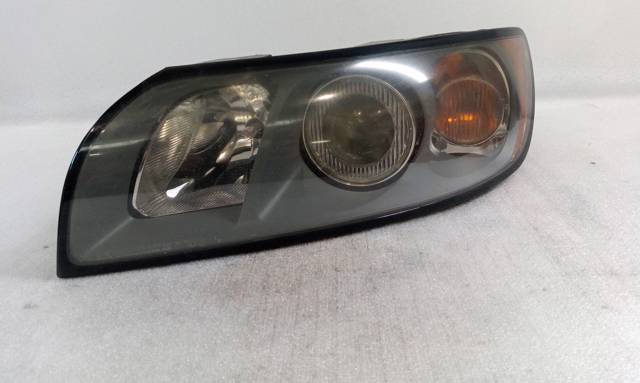 Reflektor lewy 30698885 VOLVO