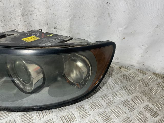Reflektor lewy 30698885 VOLVO