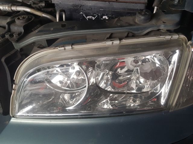 Reflektor lewy 30899682 VOLVO