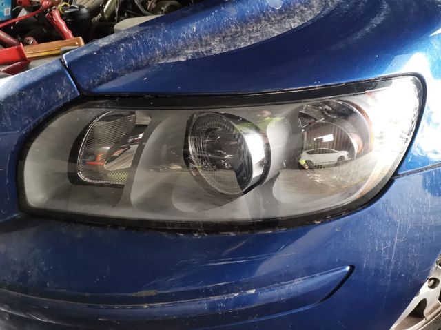 Reflektor lewy 31335221 VOLVO