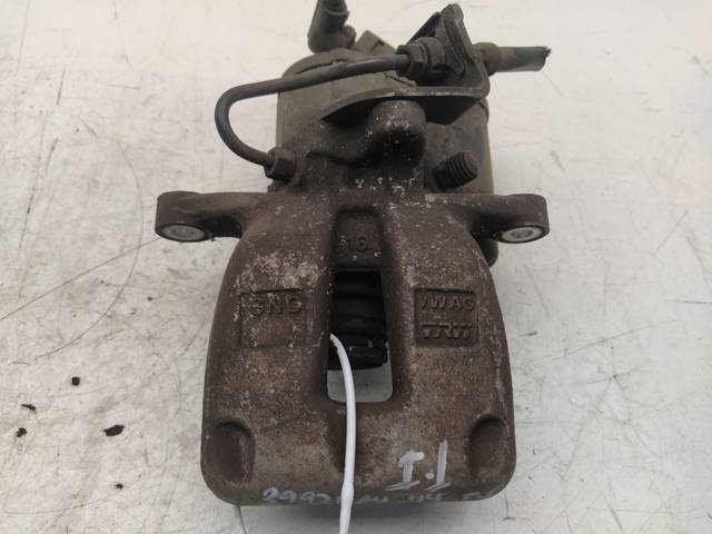 Zacisk hamulcowy tylny prawy 32335478 VAG