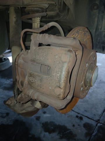Silniczek elektryczny hamulca ręcznego 32338814 RENAULT