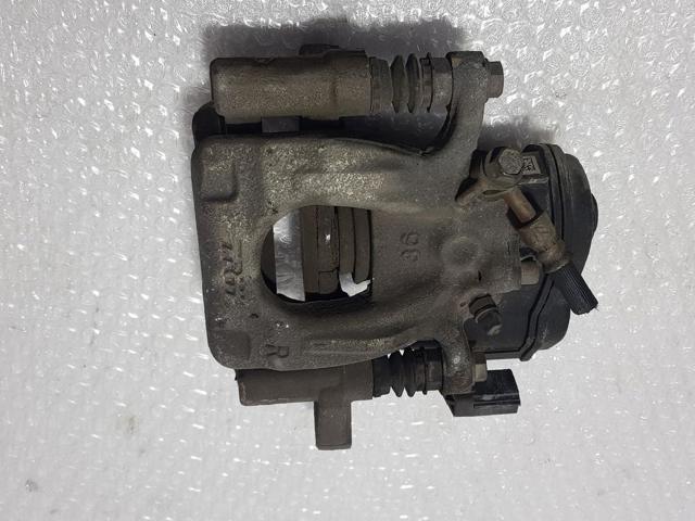 Zacisk hamulcowy tylny prawy 32353310C NISSAN
