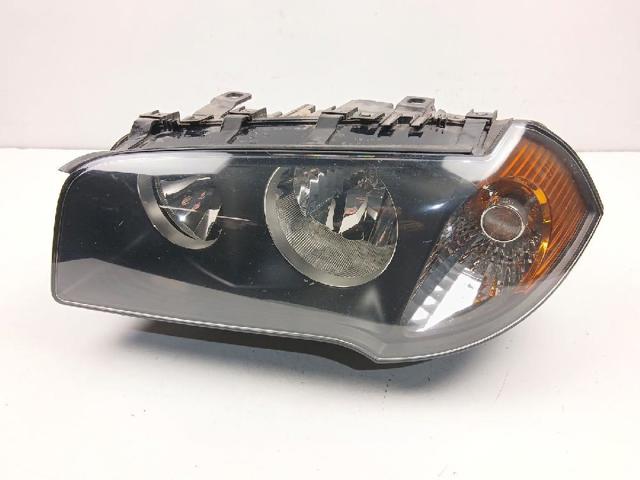 Reflektor lewy 3418399 BMW