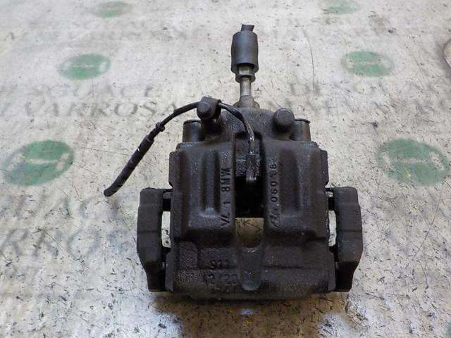 Zacisk hamulcowy tylny prawy 34216768698 BMW
