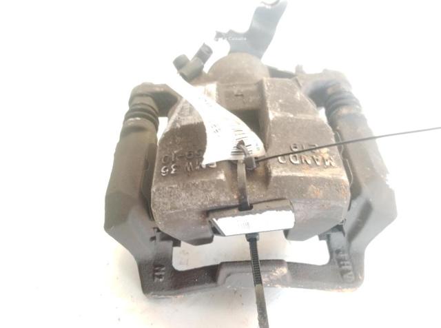 Zacisk hamulcowy tylny lewy 34216860557 BMW