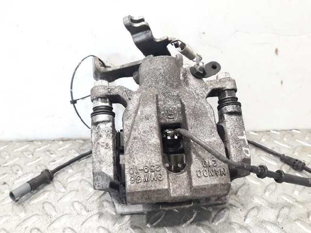 Zacisk hamulcowy tylny prawy 34216860558 BMW