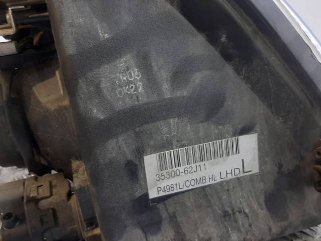 Reflektor lewy 3530062J11 SUZUKI