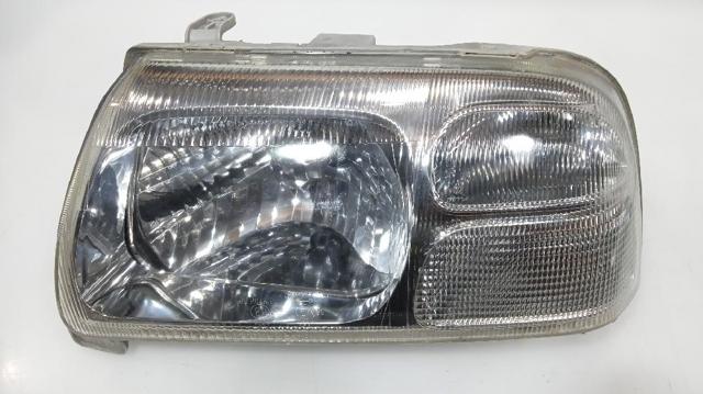 Reflektor lewy 3532065D30 SUZUKI