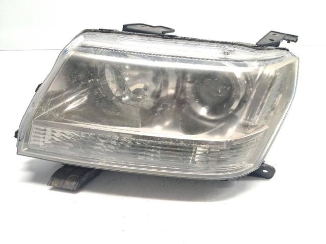 Reflektor lewy 3532065J11 SUZUKI