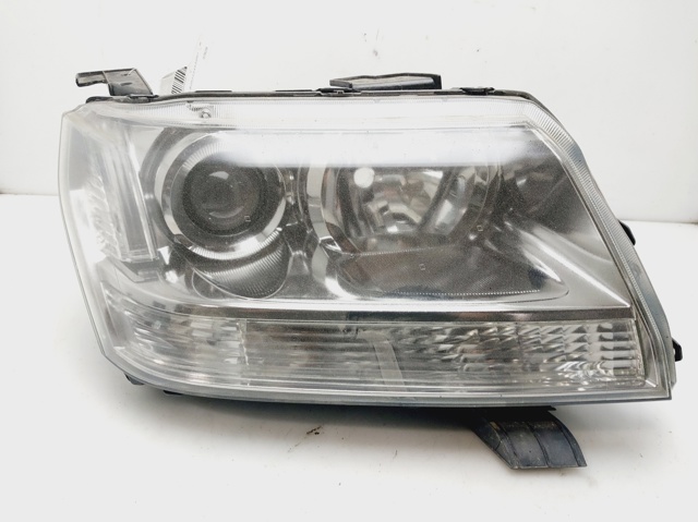 Reflektor lewy 3532065J12000 SUZUKI