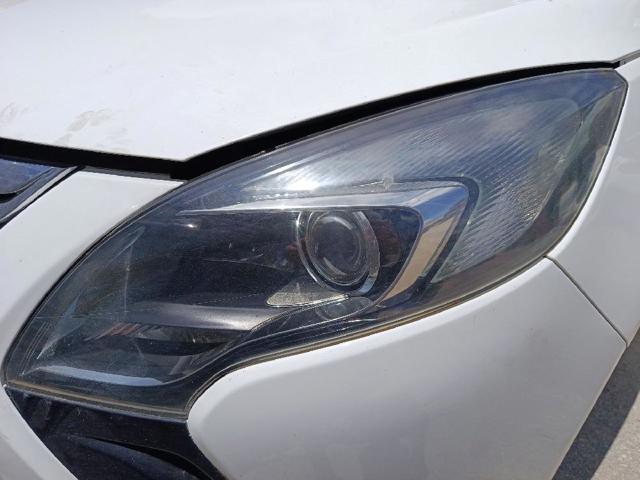 Reflektor lewy 39009021 OPEL
