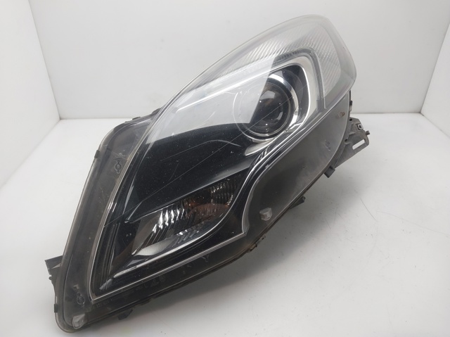 Reflektor lewy 39009021 OPEL