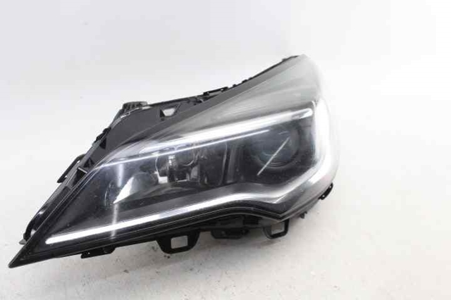 Reflektor lewy 39047198 OPEL