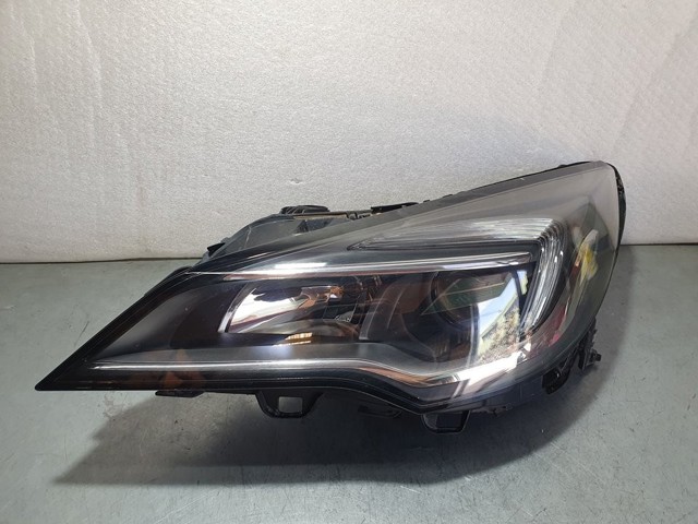 Reflektor lewy 39047198 OPEL