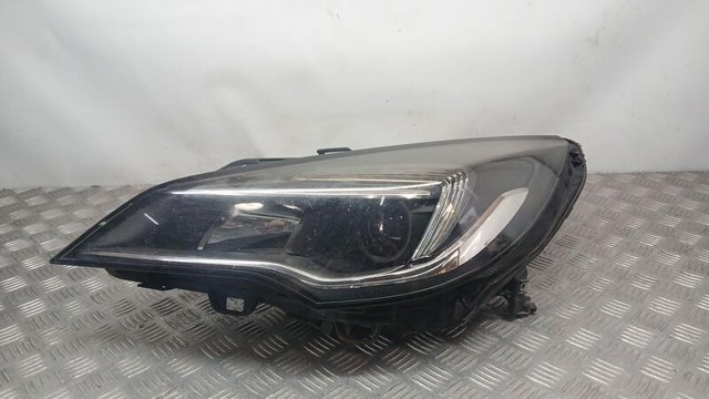 Reflektor lewy 39047198 OPEL