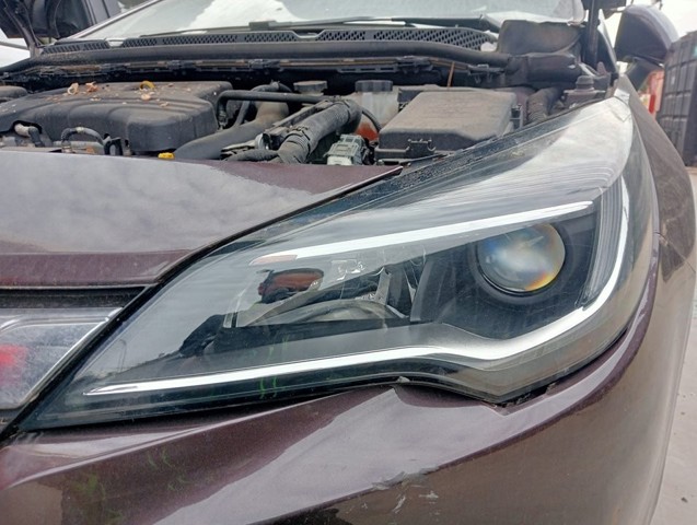 Reflektor lewy 39081892 OPEL