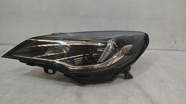 Reflektor lewy 39081892 OPEL