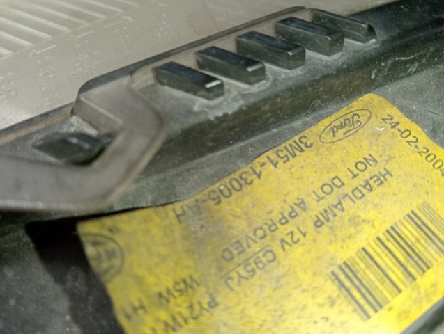 Reflektor prawy 3M5113005AH FORD