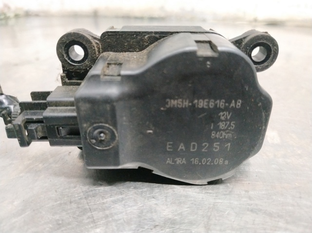 Silniczek klapy nagrzewnicy 3M5H19E616AB FORD