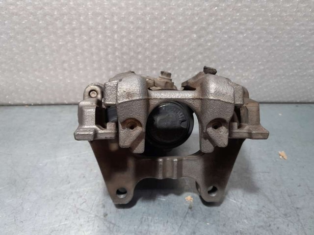 Zacisk hamulcowy tylny prawy 3Q0615406 VAG