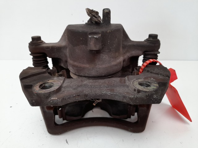 Zacisk hamulcowy przedni lewy 410114U10A NISSAN