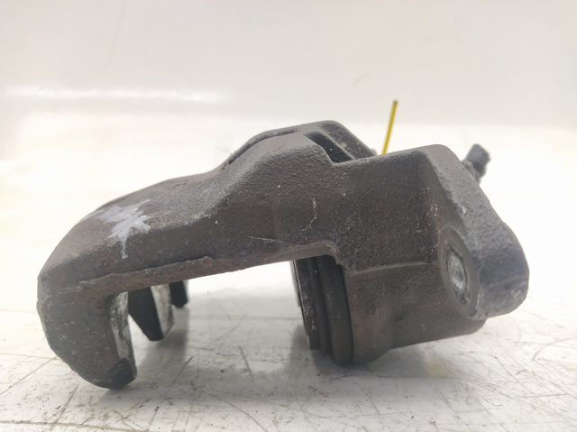 Zacisk hamulcowy przedni lewy 41011ZS60A NISSAN