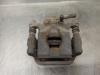 Zacisk hamulcowy tylny prawy 440011KD0A NISSAN