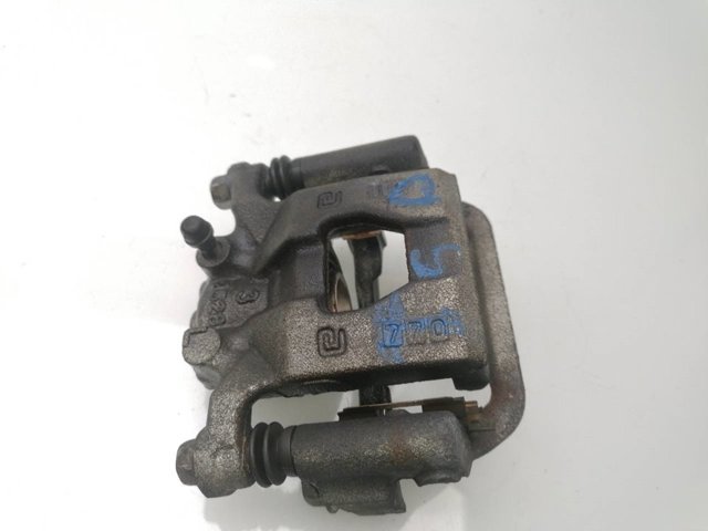 Zacisk hamulcowy tylny prawy 440011KD0A NISSAN